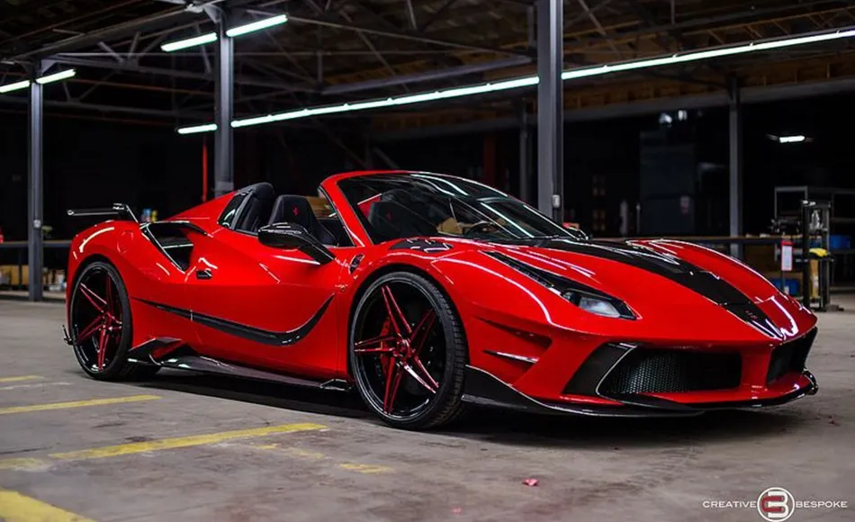 Sports car staged for a photo shoot inside the warehouse
