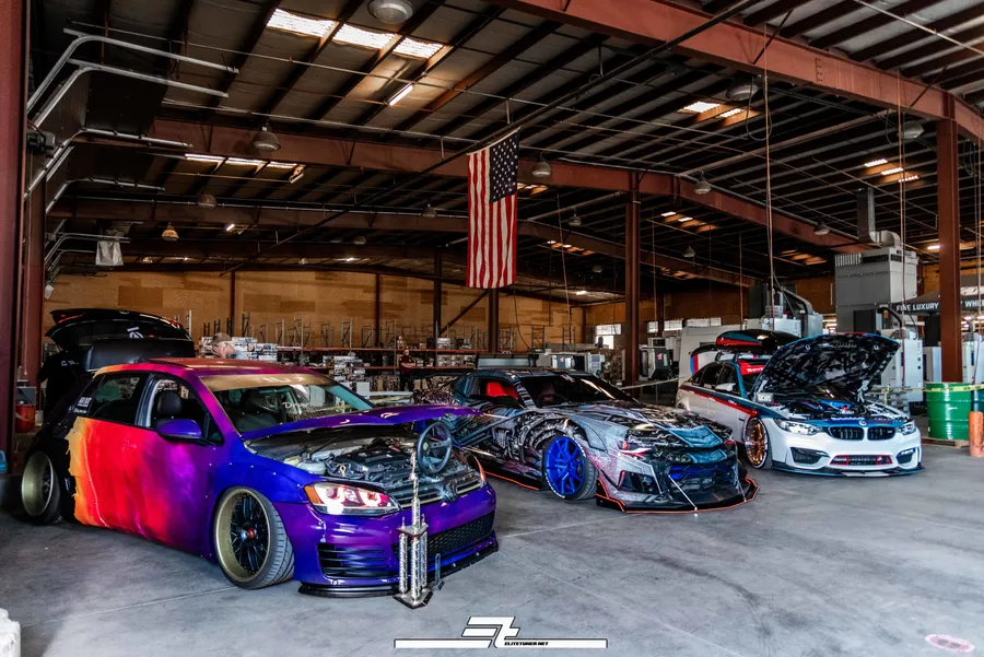 Cars staged with production lighting inside Sunkist Warehouse