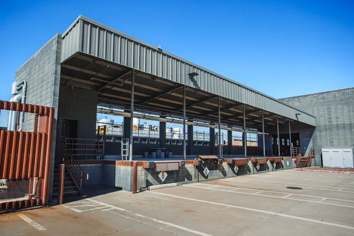 The Dock — covered loading dock along the east side of the building