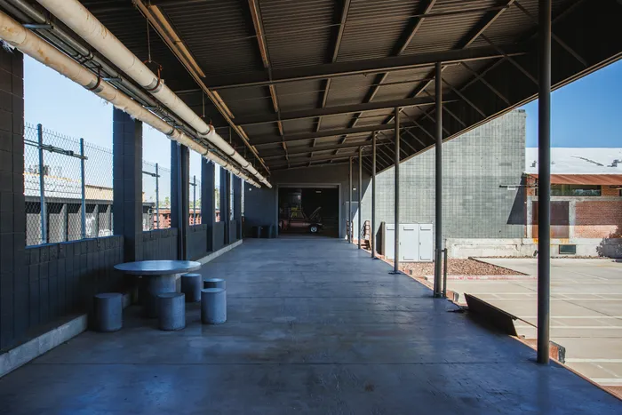 The Premier — 155-foot covered run along the building with daylight down its length