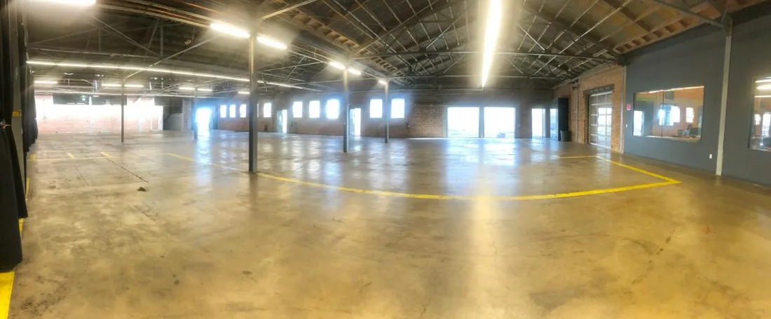 Empty warehouse floor in full daylight