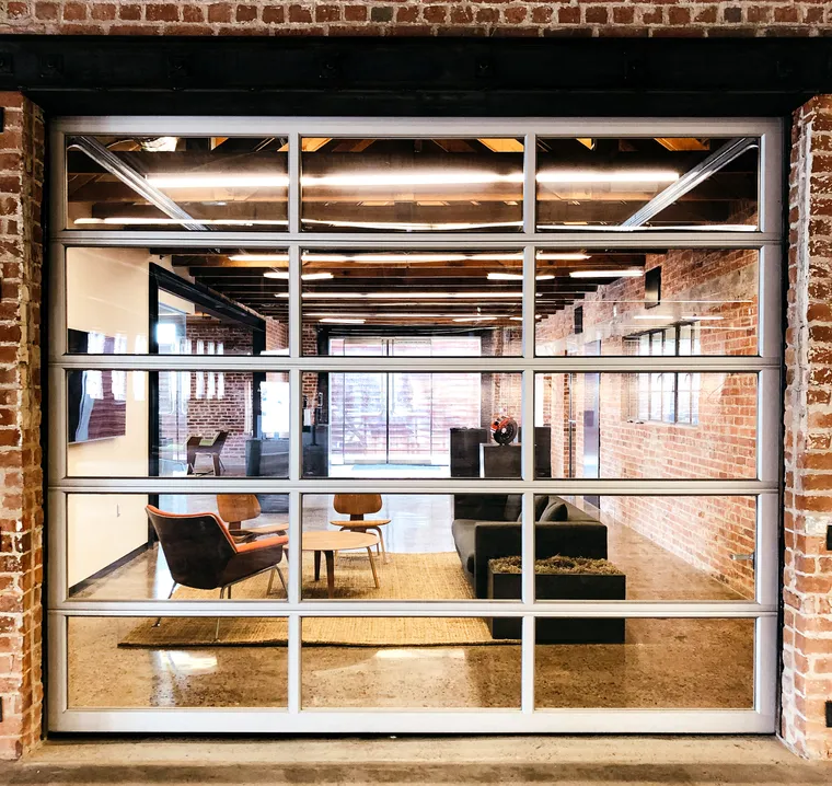 The Lobby — polished concrete and original brick, always climate controlled